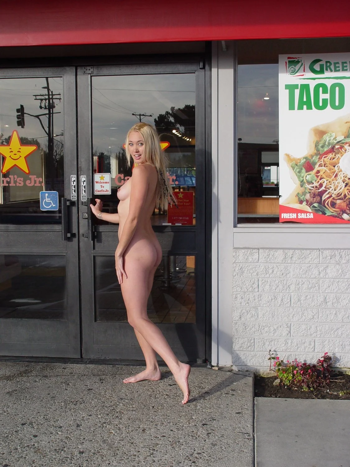 Daring Blonde completely naked in public image 39