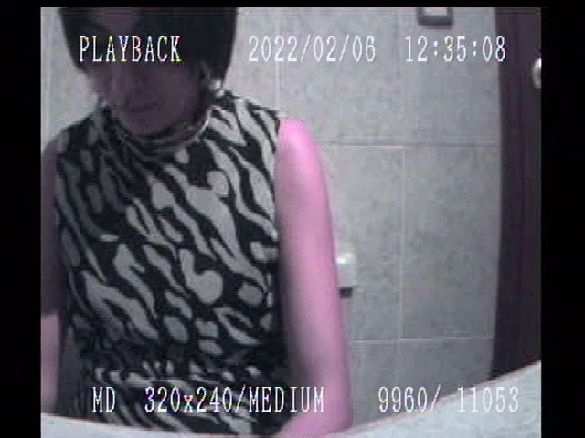 Hairy MILF hidden cam image 8