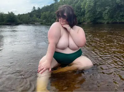 Midwest BBW flashes her tits in public while canoeing. Pinches and licks her own nipples. cover image