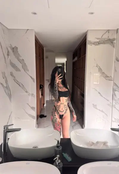 This tattooed ass needs to be used daily cover image