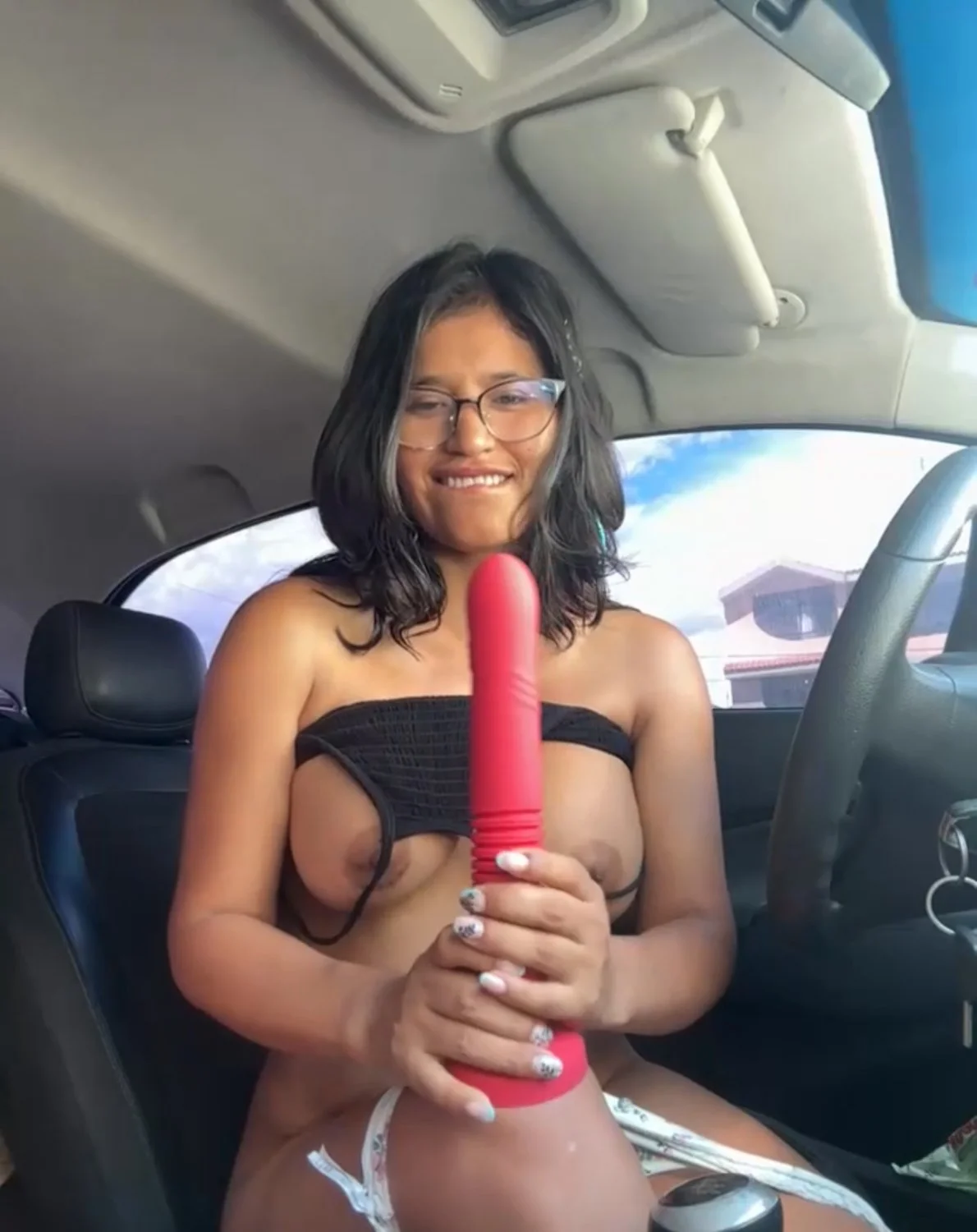 Hot Latina in her car alone horny image 3