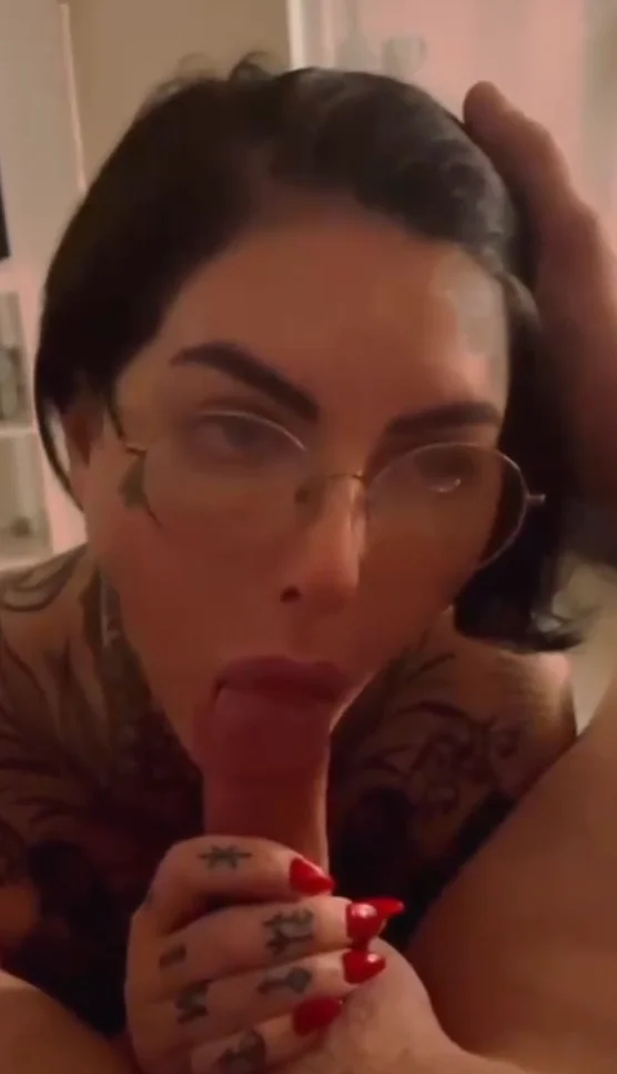 Tattooed brunette slut sucks horny cock main image