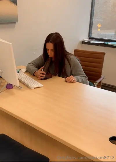 Sucking and fucking her bbc dildo at her office cover image