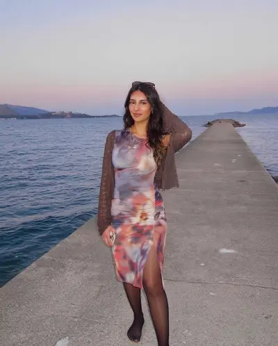 Sexy teen showing off her sexy legs in sheer pantyhose cover image