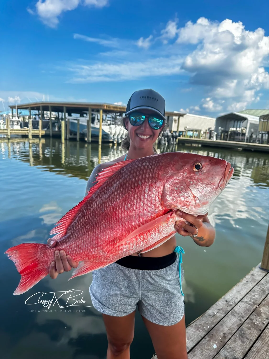 Do you find girls who fish sexy babe? main image