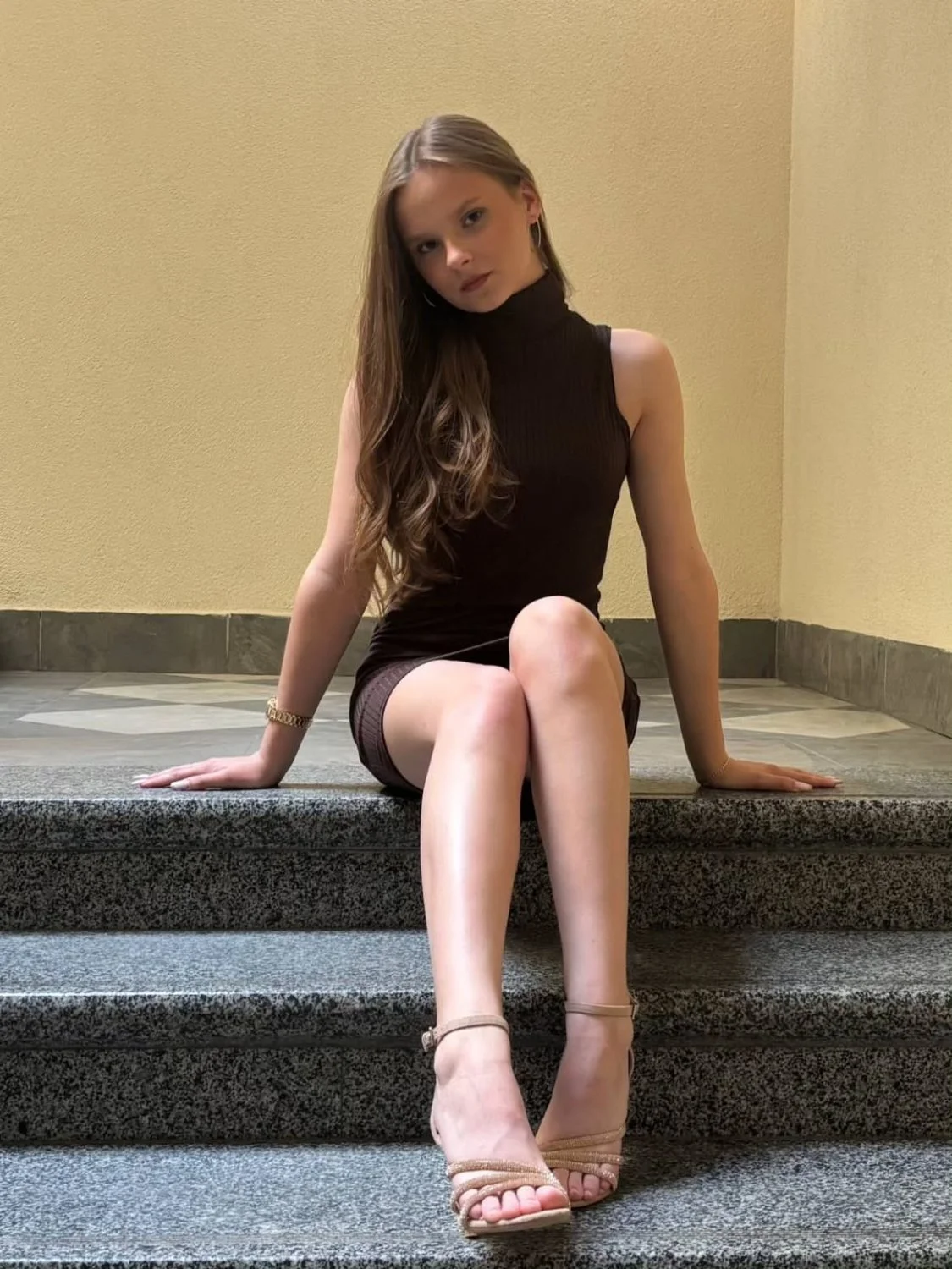 Young slut. Black dress and sexy feet main image