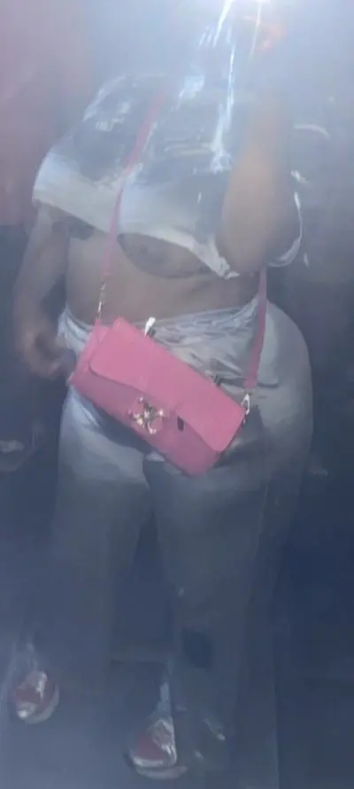 Dominicana mostrando su tetona cover image