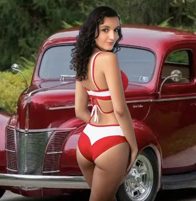 sexy bikini babe poses at the auto show cover image