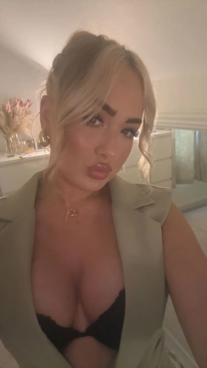 Blonde slut teasing her big fake titts tease chav uk image 2