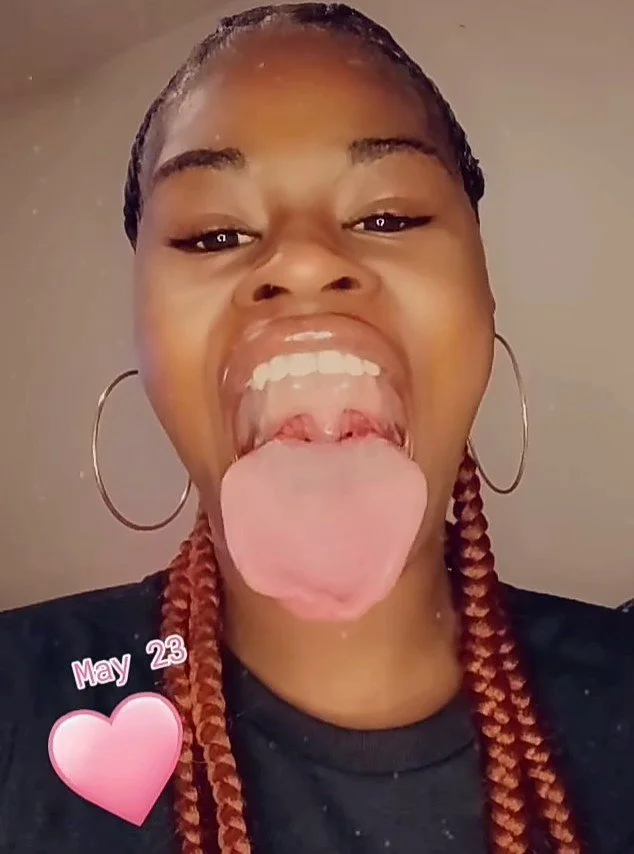 Showing me her big beautiful tongue image 4