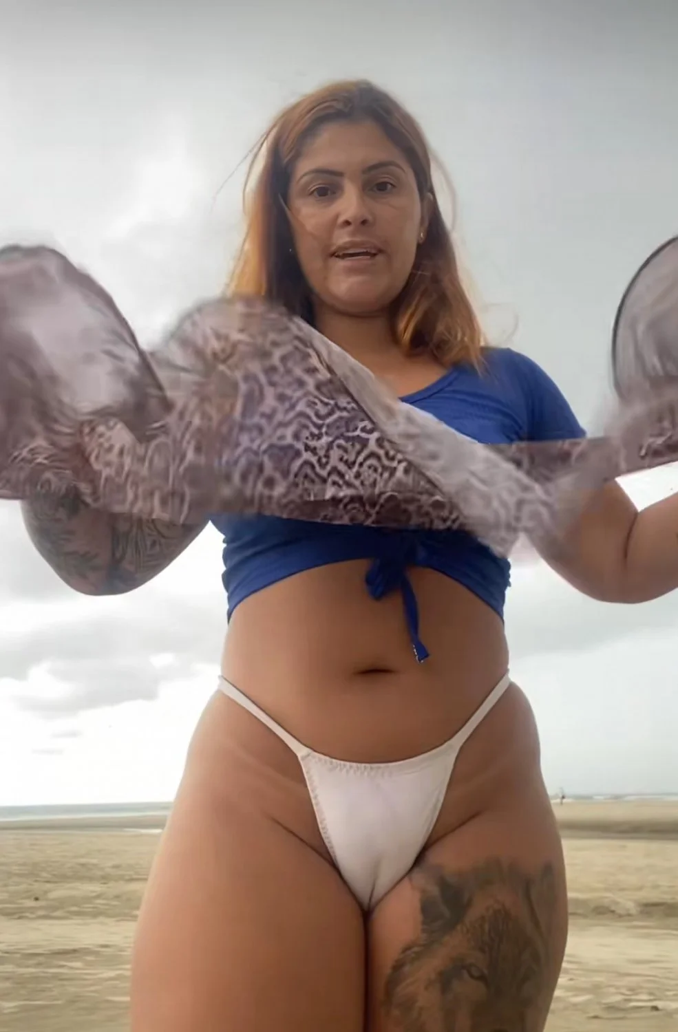 Brazilian swinger couple who live and fuck on the beach image 17