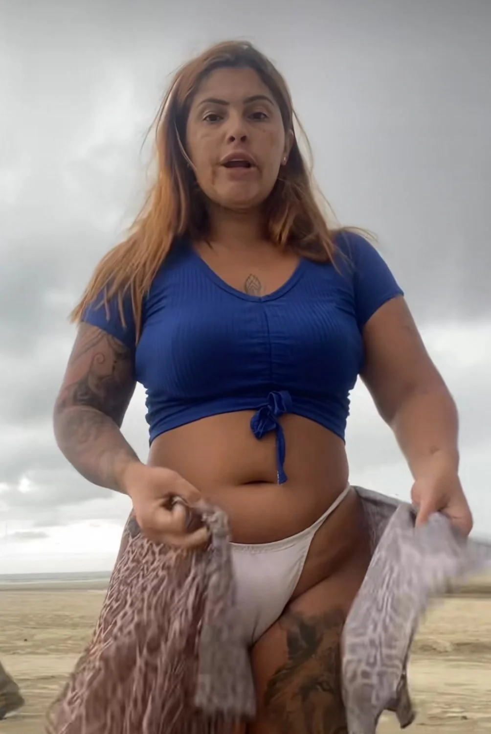 Brazilian swinger couple who live and fuck on the beach image 20