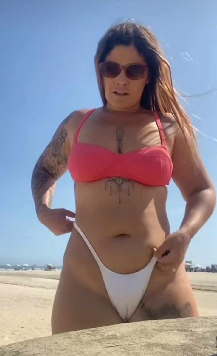 Brazilian swinger couple who live and fuck on the beach image 36