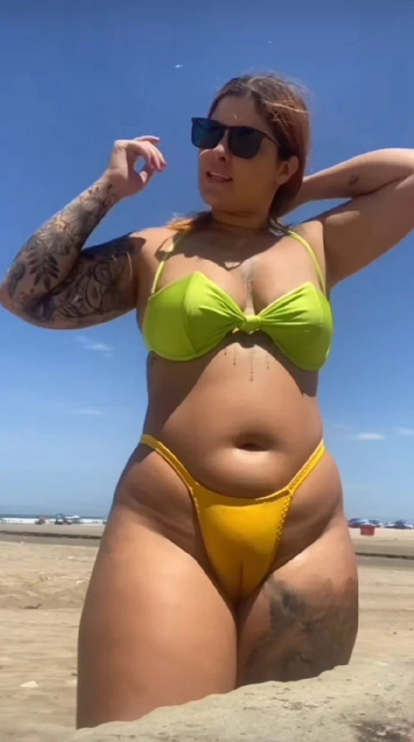 Brazilian swinger couple who live and fuck on the beach image 40