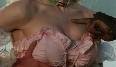 Phoebe Legere: Trying to disguise her tiny tits in the Movie Toxic Avengers cover image