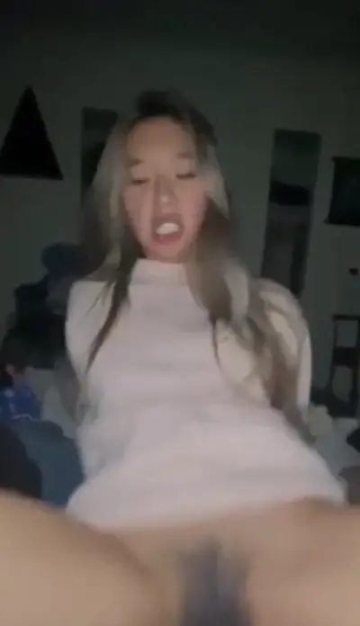 Horny asian teen with hairy pussy rides cock cover image