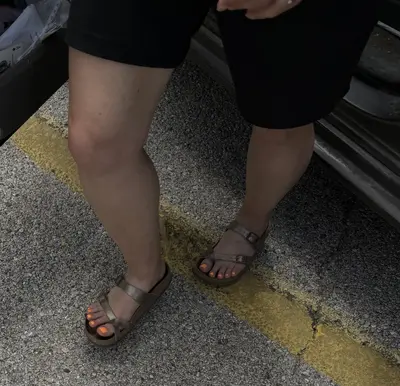 Woman’s Feet in sandals cover image