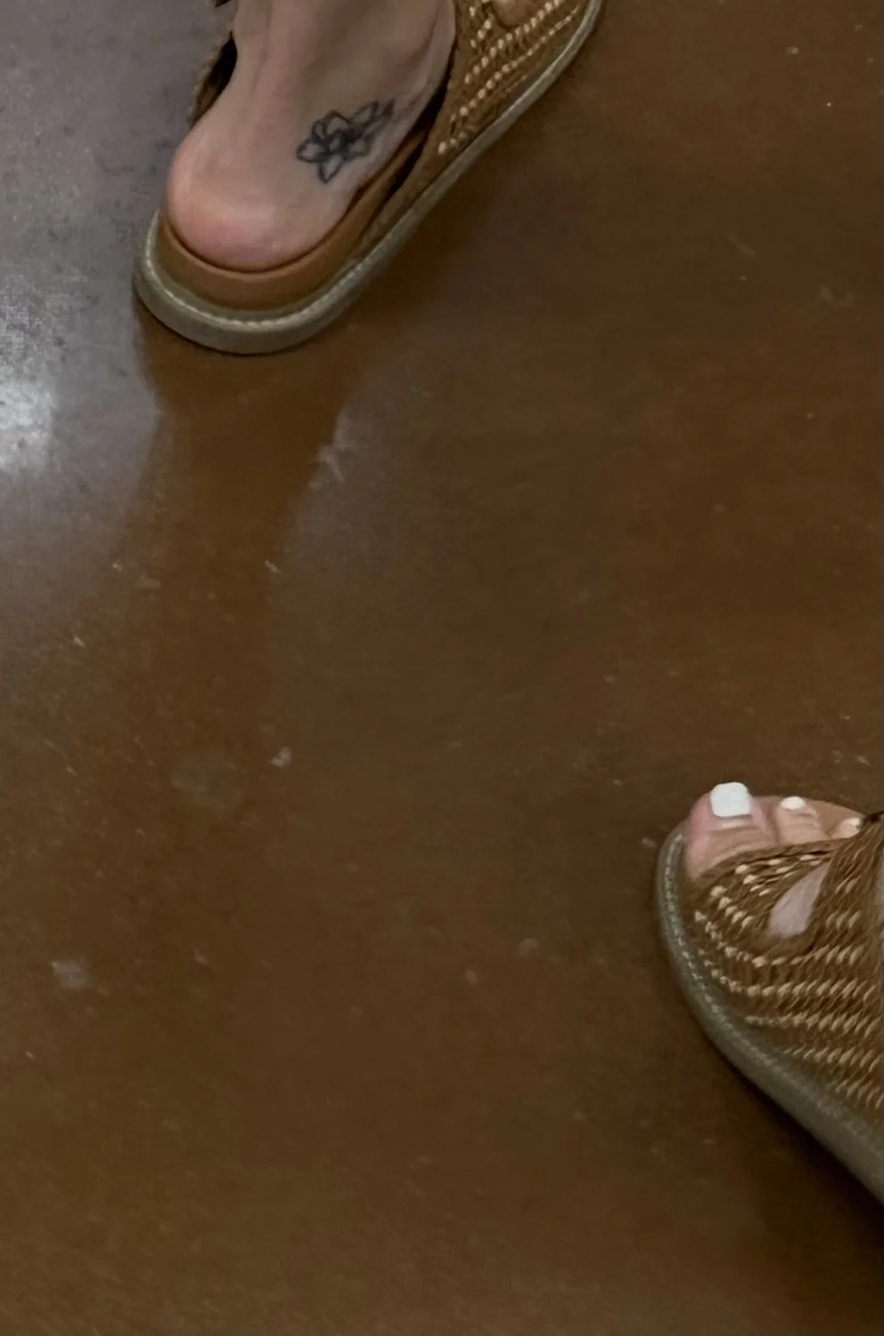 Rich MILF feet in sandals image 2
