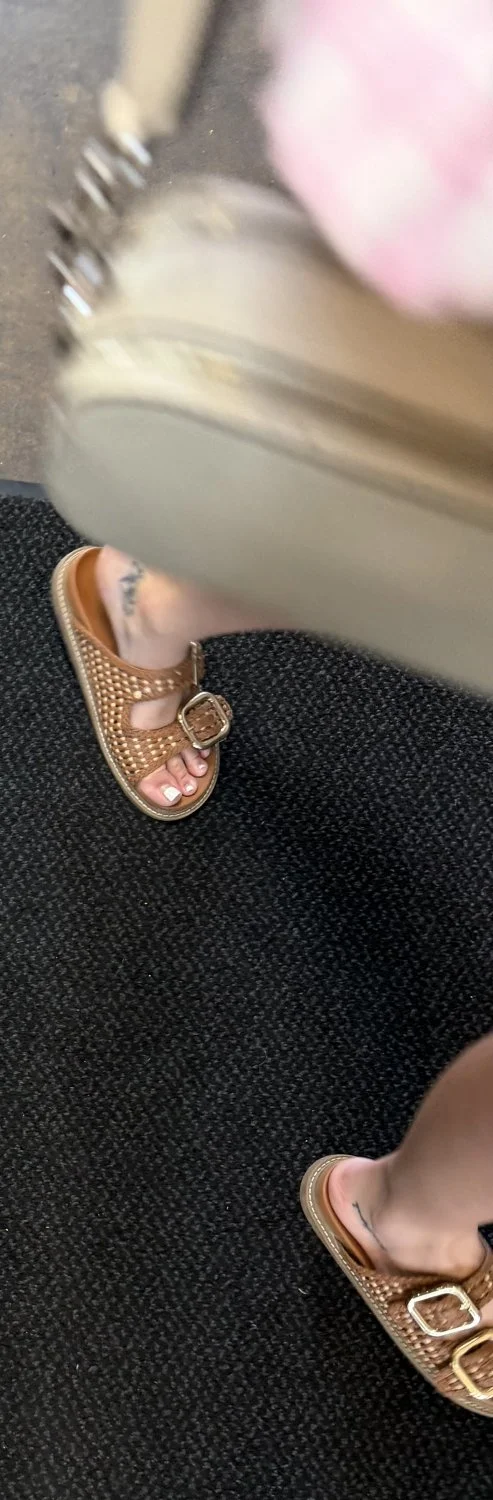 Rich MILF feet in sandals image 3