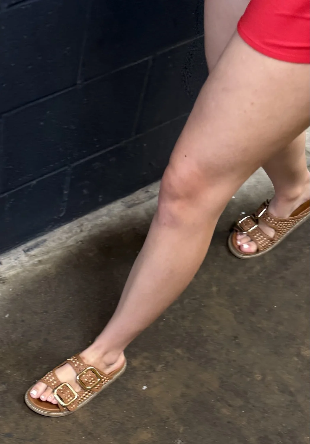 Rich MILF feet in sandals image 8