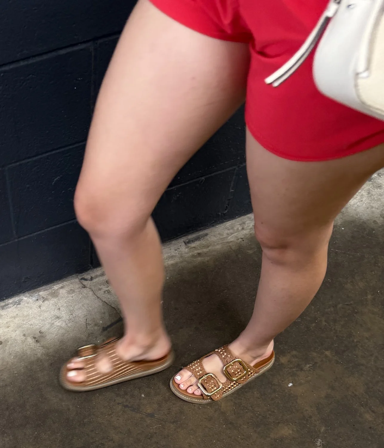 Rich MILF feet in sandals image 9