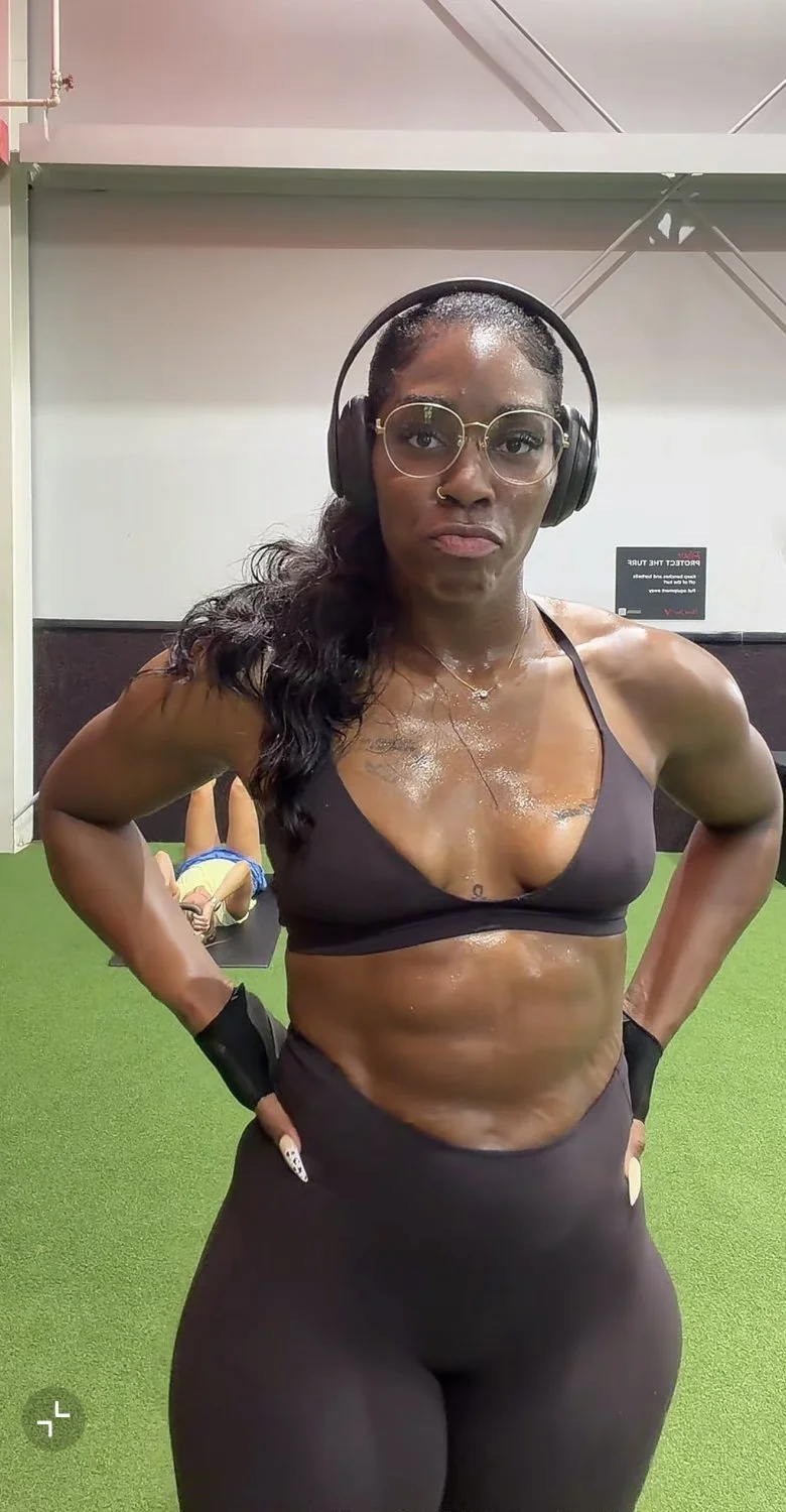 Black muscular gym slut showing off her fat ass image 1