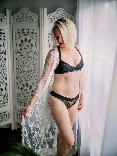 Petite green eyed blonde boudoir cover image