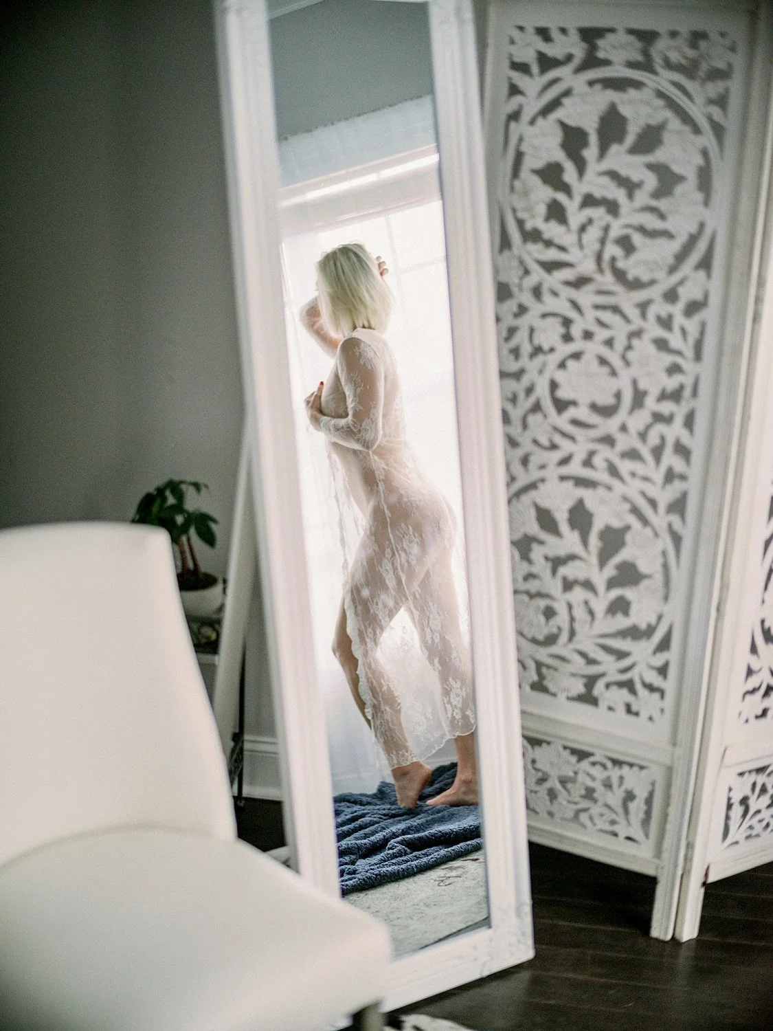 Petite green eyed blonde boudoir image 17