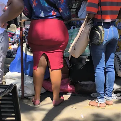 some guy follwed and took pictures of her ass 2 cover image