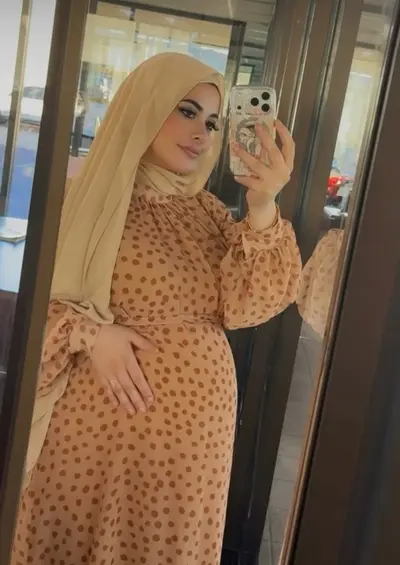 Cute Big Breasted Muslim hijab wearing whore shows off her holes cover image