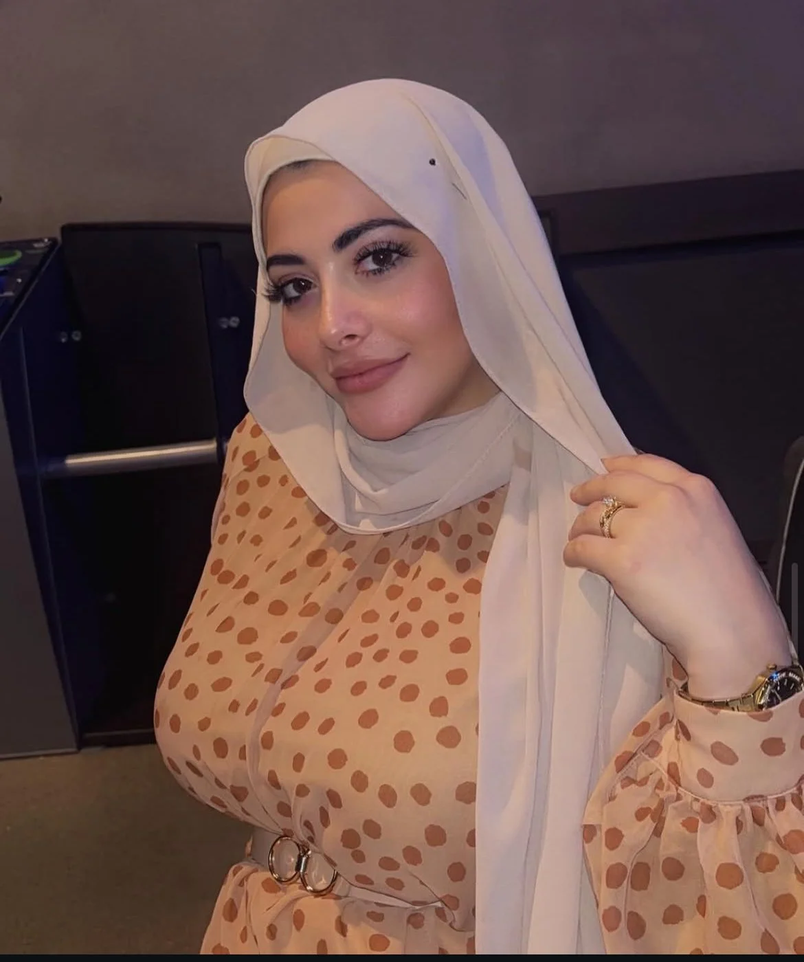 Cute Big Breasted Muslim hijab wearing whore shows off her holes image 4