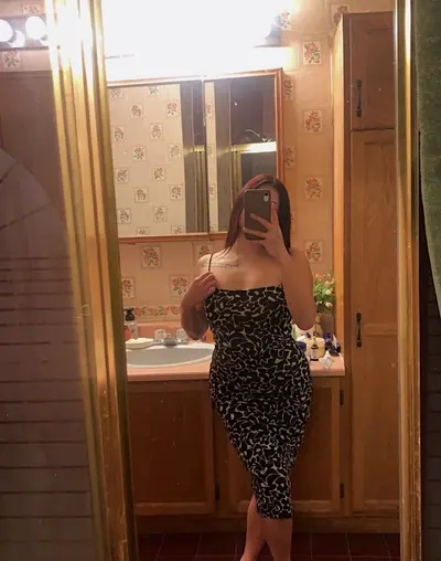 Does she look better dressed or bikini? cover image