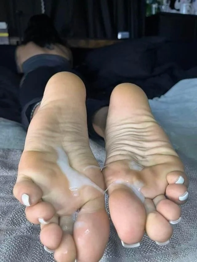 Sluts licking cum off their feet image 5
