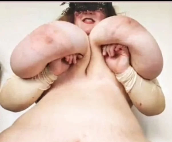 Massive Huge Soft Tits image 18