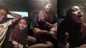Ukhti Jilbab Main di Mobil suami orang main image