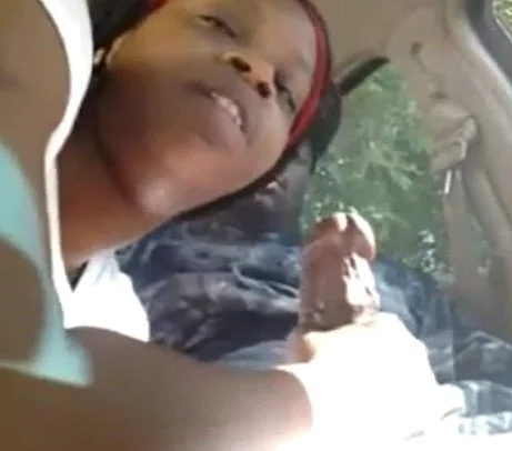 Black bitch sucking dick in a car on hidden cam image 2