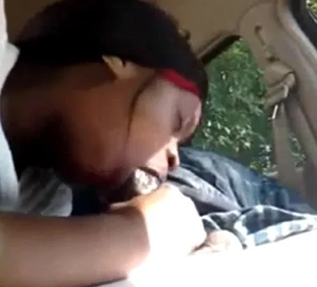 Black bitch sucking dick in a car on hidden cam image 3