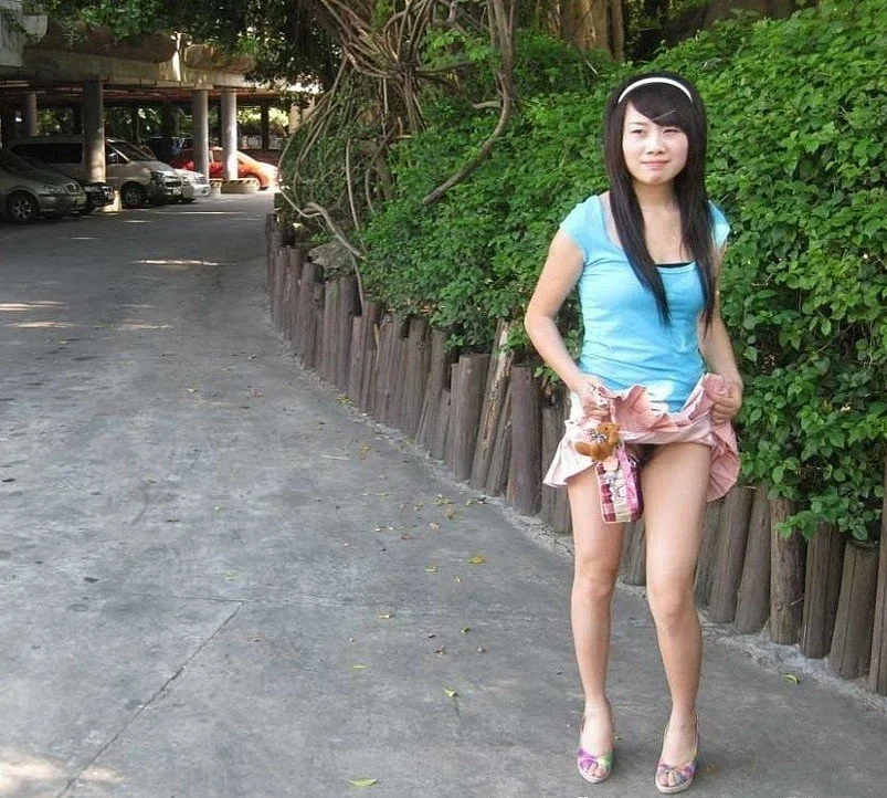 Asians Girls Displaying Their Erotic Charm Outdoors image 5