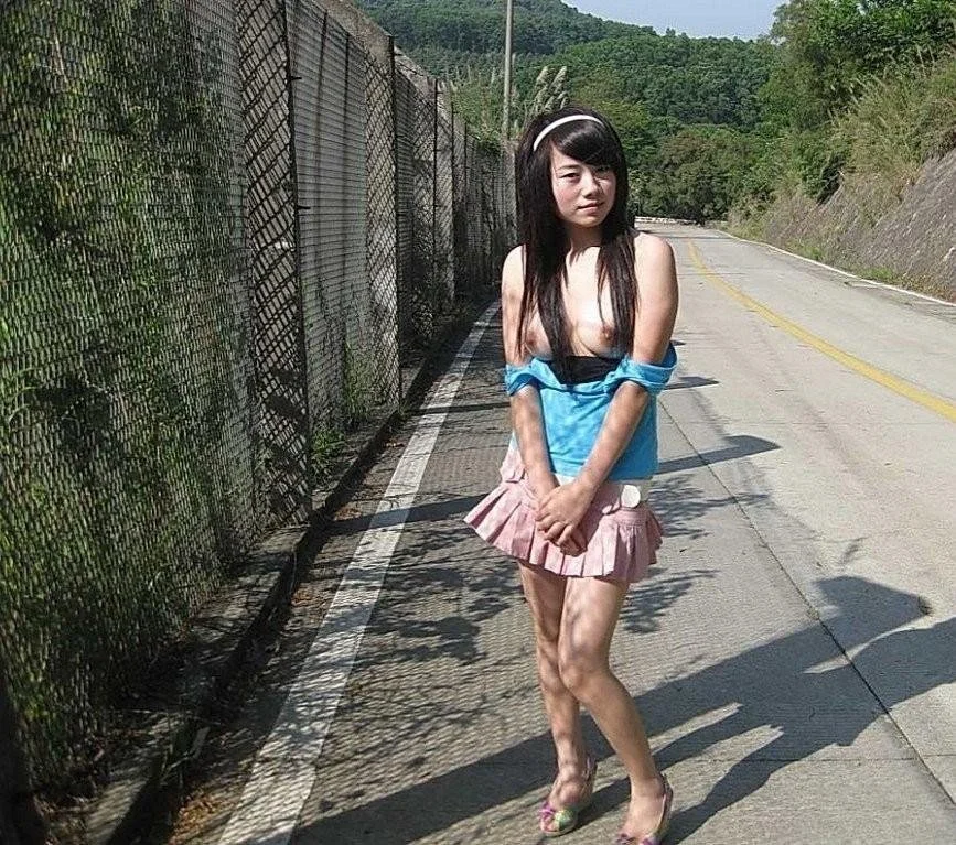 Asians Girls Displaying Their Erotic Charm Outdoors image 6