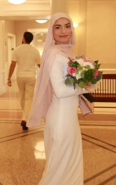 Cute newly college grad Muslim bitch fucks herself with a cucumber wishing it was a dick cover image