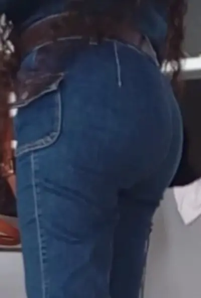 Sexy girl in jeans with perfect ass in public hot + fake nude ass cover image