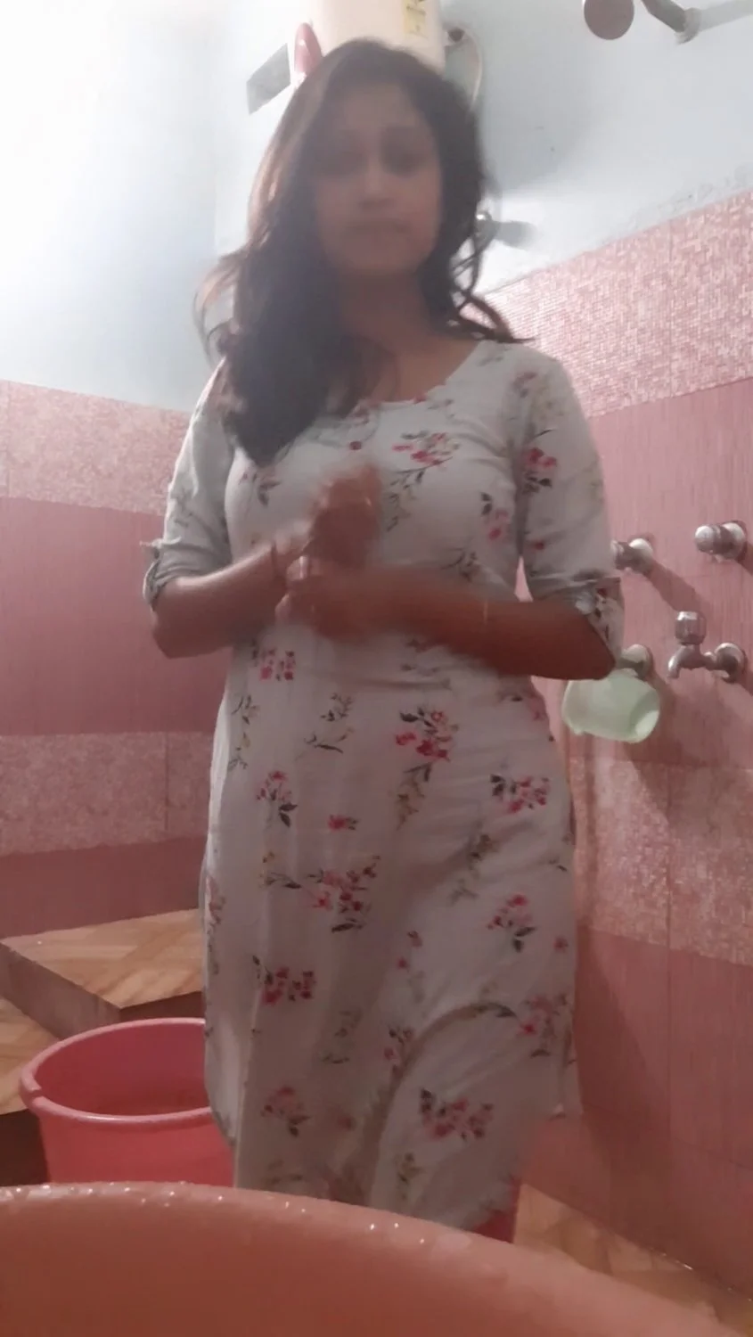 Indian beauty films herself showering 😍 image 1