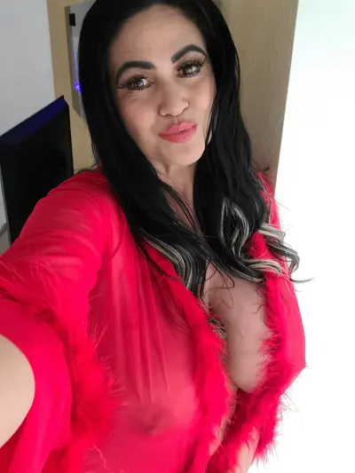 Naughty milf in red cover image