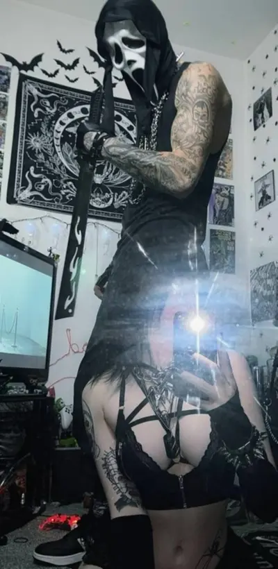 This goth girl likes it when a man empties his balls on her face cover image