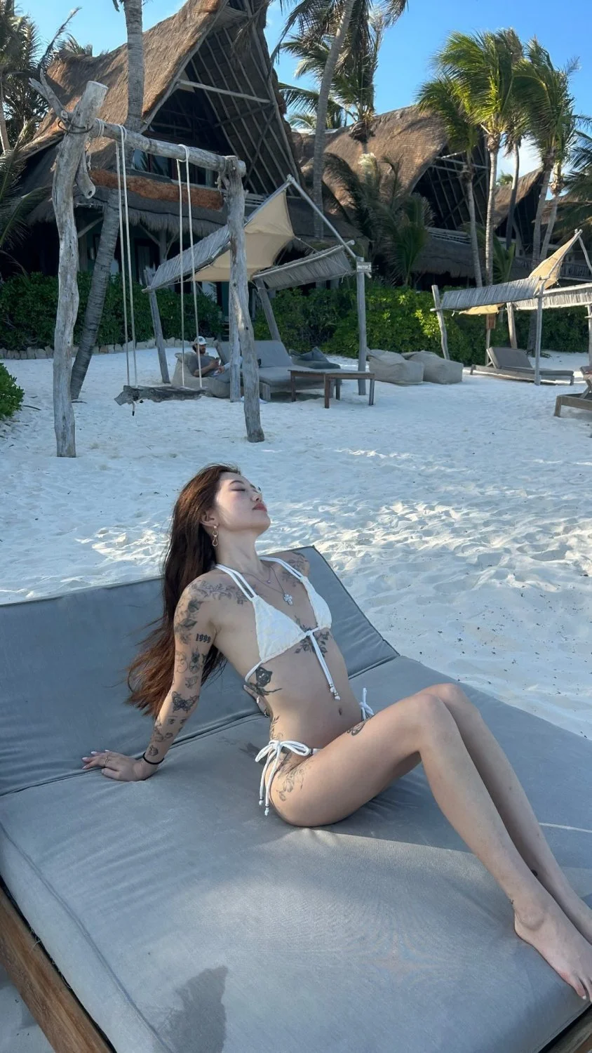 Tatted Asian Slut Kimmi Plays With Her Pussy image 2