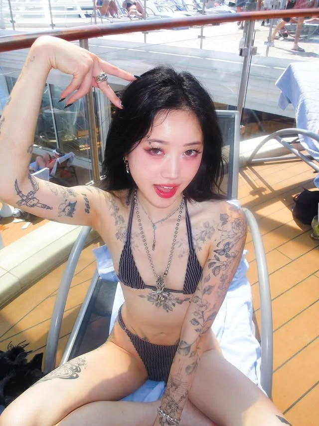 Tatted Asian Slut Kimmi Plays With Her Pussy image 6