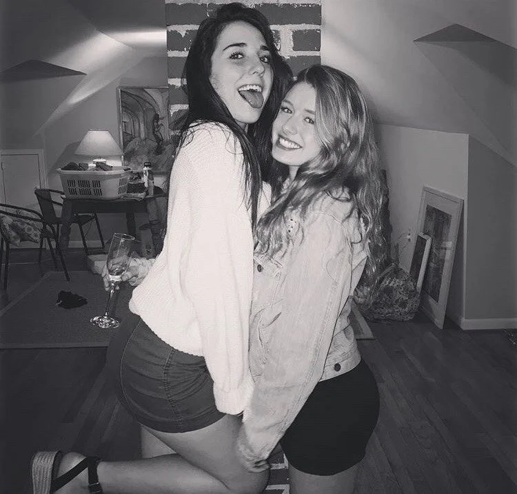 teen licks her friend's soles image 2
