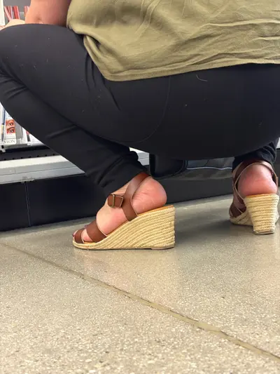 Mature feet in wedges cover image