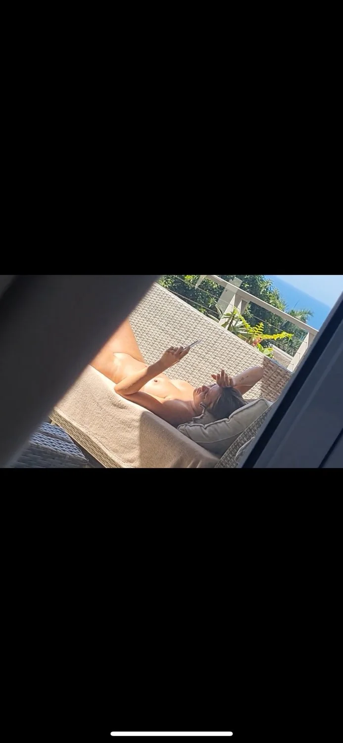 Spying On My Sister Sunbathing image 1