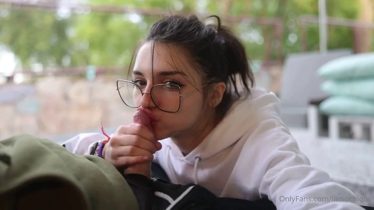 Little Slut Gives A Risky Blowjob In Public image 3